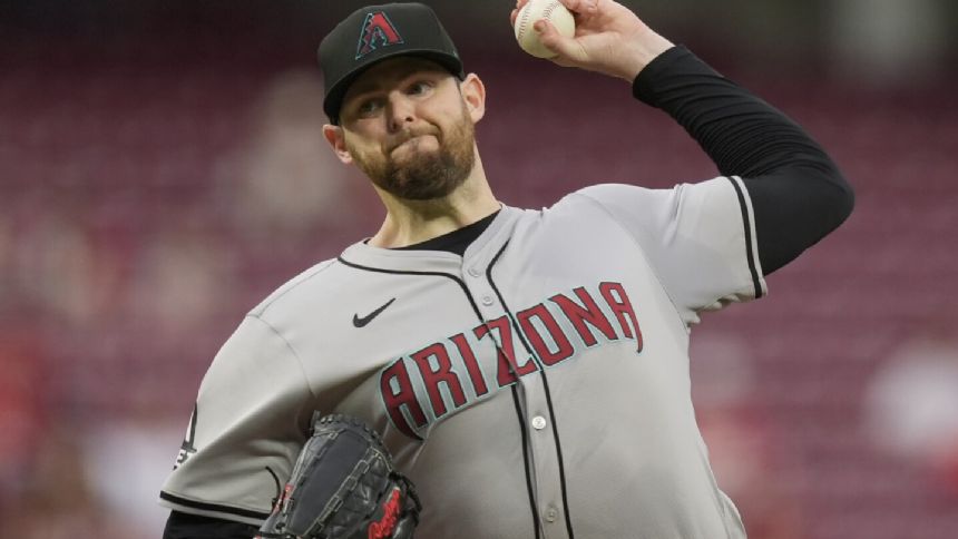 Montgomery throws 7 solid innings and Diamondbacks hold off Reds 4-3. Cincy's skid now 7 games.