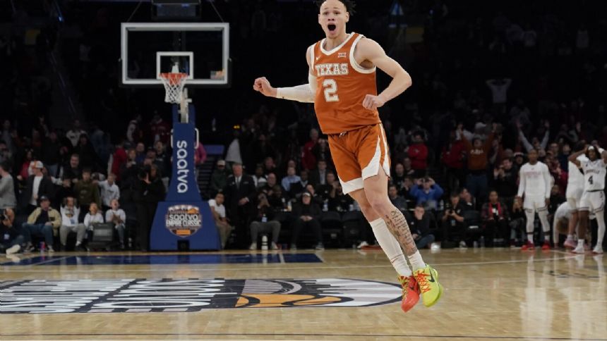 Abmas hits game-winner as No. 19 Texas outlasts Louisville 81-80 in Empire Classic
