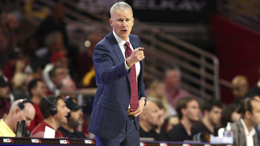 ACC-bound SMU close to hiring USC's Andy Enfield as the Mustangs' basketball coach, AP source says