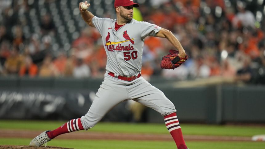 Adam Wainwright finally earns his 199th victory, and Cardinals top AL-leading Orioles 5-2