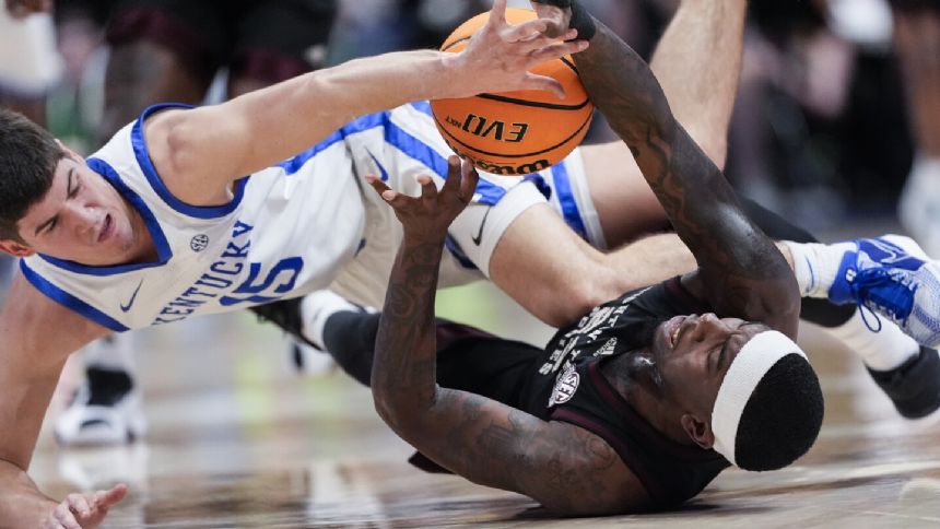 Aggies turn in 2nd upset of SEC quarterfinals, downing No. 9 Kentucky 97-87