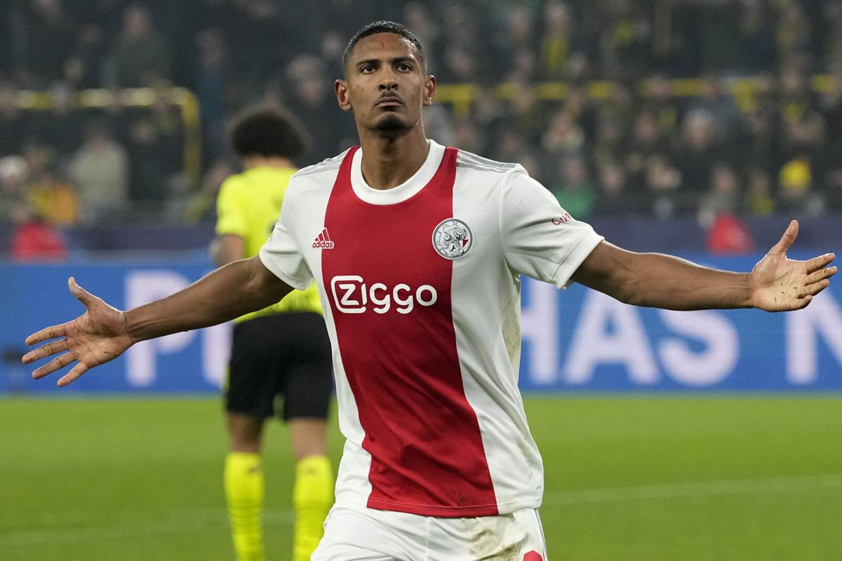 Ajax beats 10-man Dortmund to reach Champions League last 16