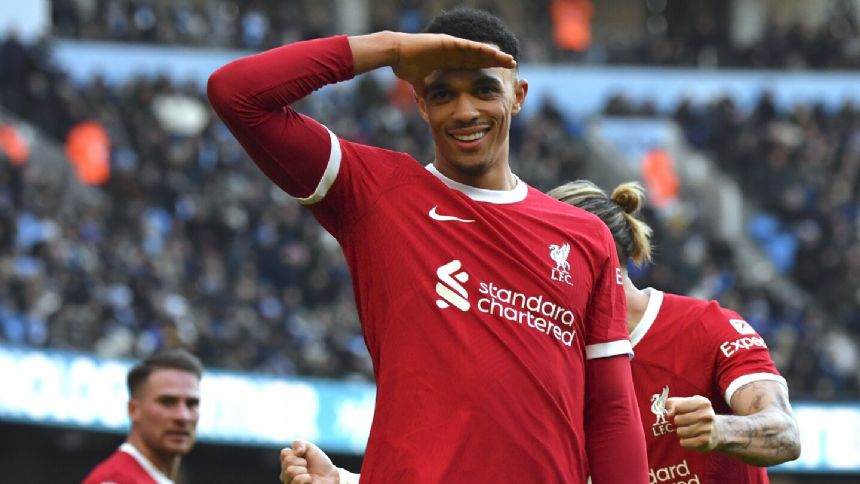 Alexander-Arnold earns Liverpool 1-1 draw against Man City. Haaland sets scoring record