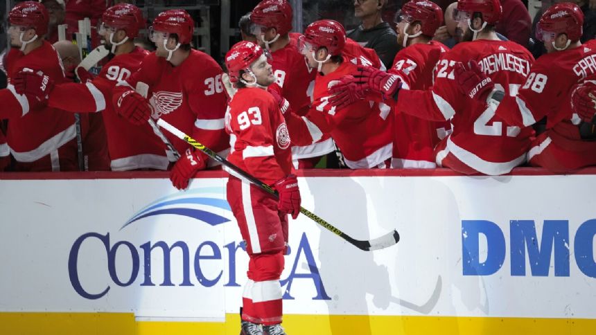 Andrew Copp, Alex DeBrincat each score twice, Red Wings beat Penguins 6-3