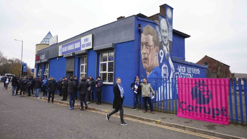 Angry Everton fans march to Goodison Park in protest at 10-point deduction in Premier League