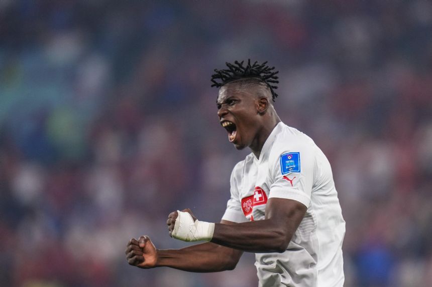 AP PHOTOS: World Cup highlights from Day 13