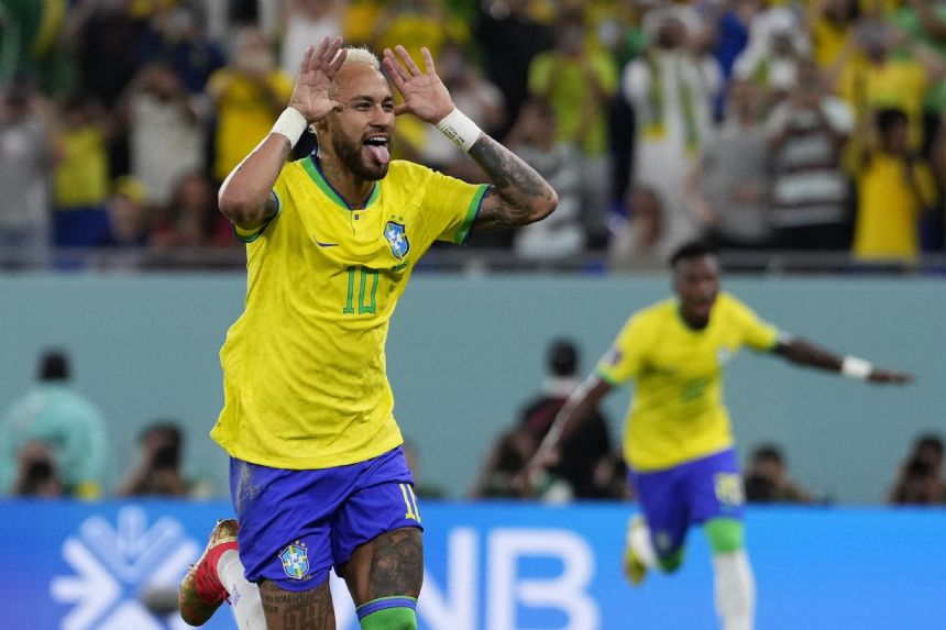 AP PHOTOS: World Cup highlights from Day 16