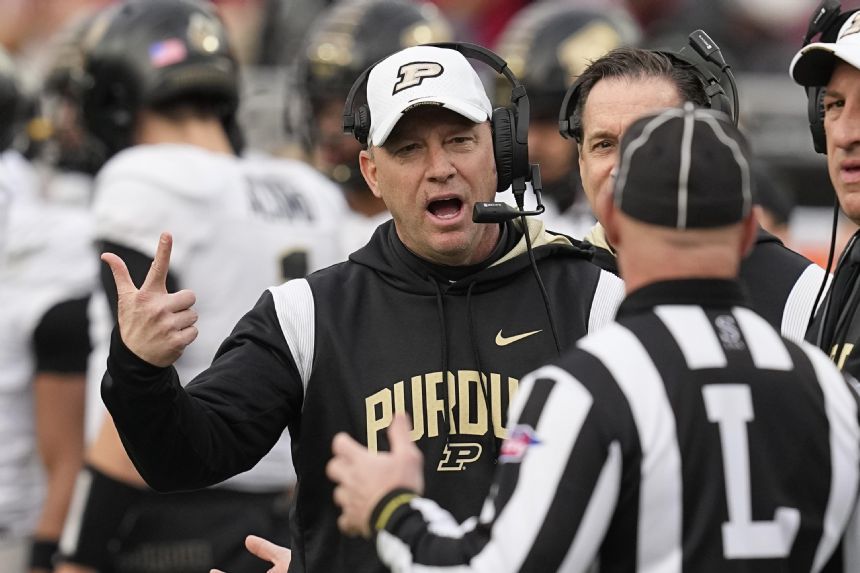 AP source: Louisville to hire Purdue's Jeff Brohm as coach