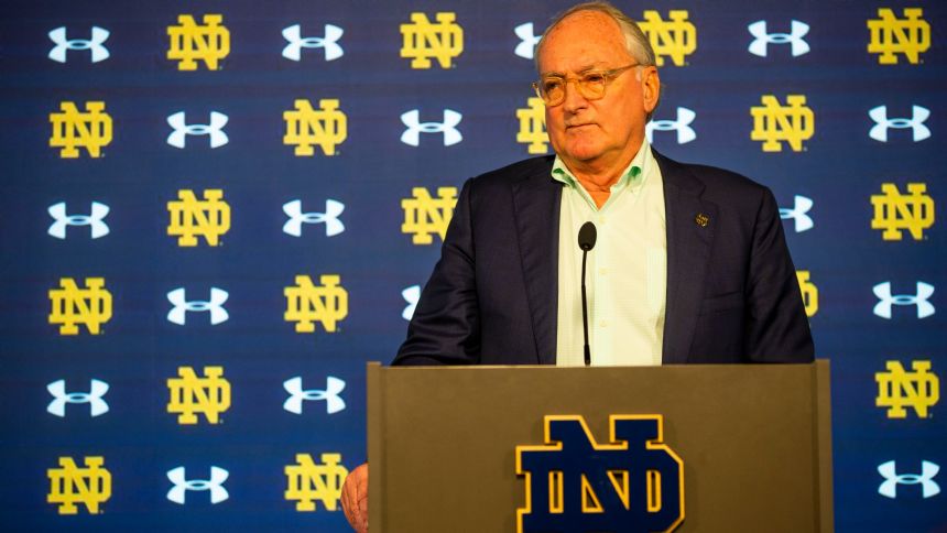AP source: Notre Dame set to promote Freeman to head coach