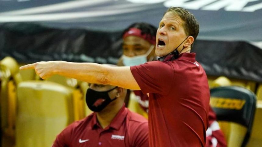 Arkansas coach Eric Musselman out two games for shoulder surgery; former NBA coach Keith Smart to lead team