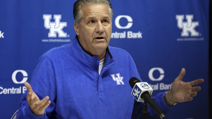 Arkansas hires John Calipari to coach the Razorbacks, a day after stepping down from Kentucky