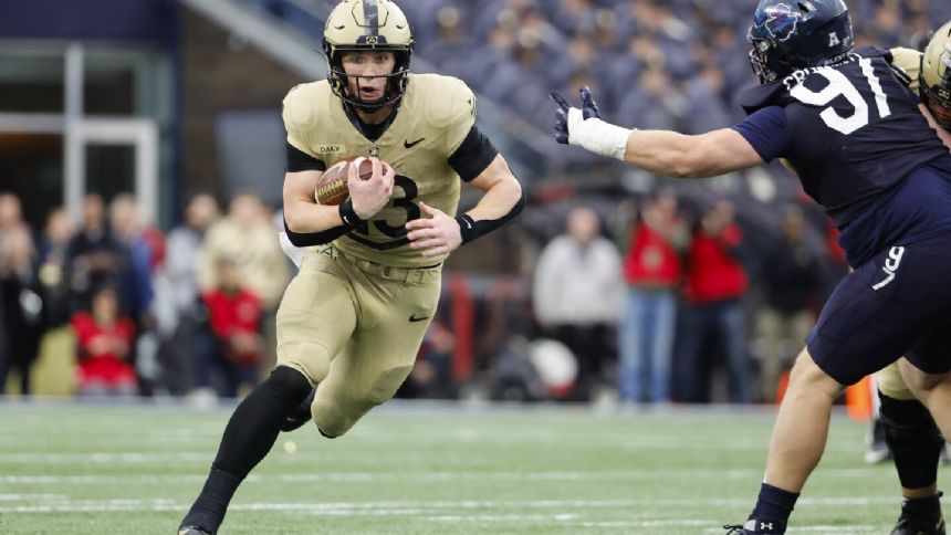 Army holds on with goal-line stand in final seconds, beats Navy 17-11