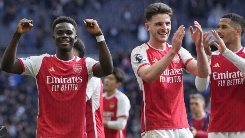 Arsenal beats Tottenham 3-2 and stays ahead in Premier League title race