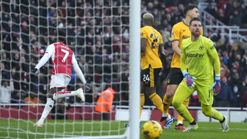 Arsenal dominates early and then hangs on to beat Wolves in EPL