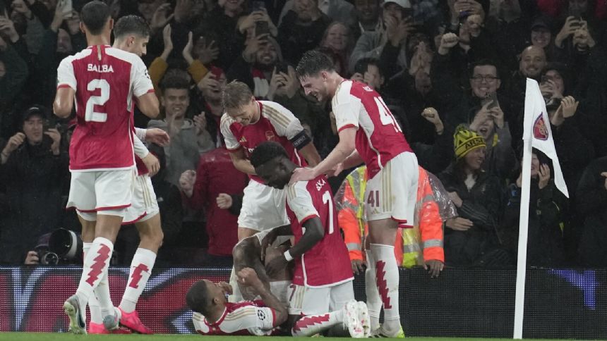 Arsenal makes winning return to Champions League by beating PSV Eindhoven 4-0 in the rain