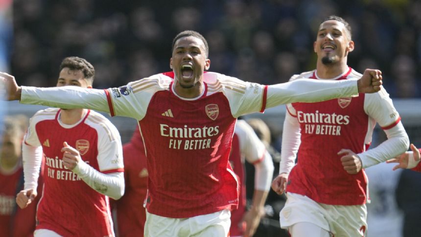 Arsenal survives scare at Tottenham and extends lead at the top to four points