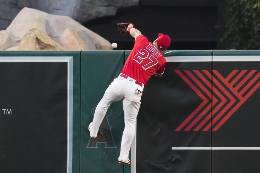 A's hit 5 home runs, rally for 11-10 win over Angels in 10