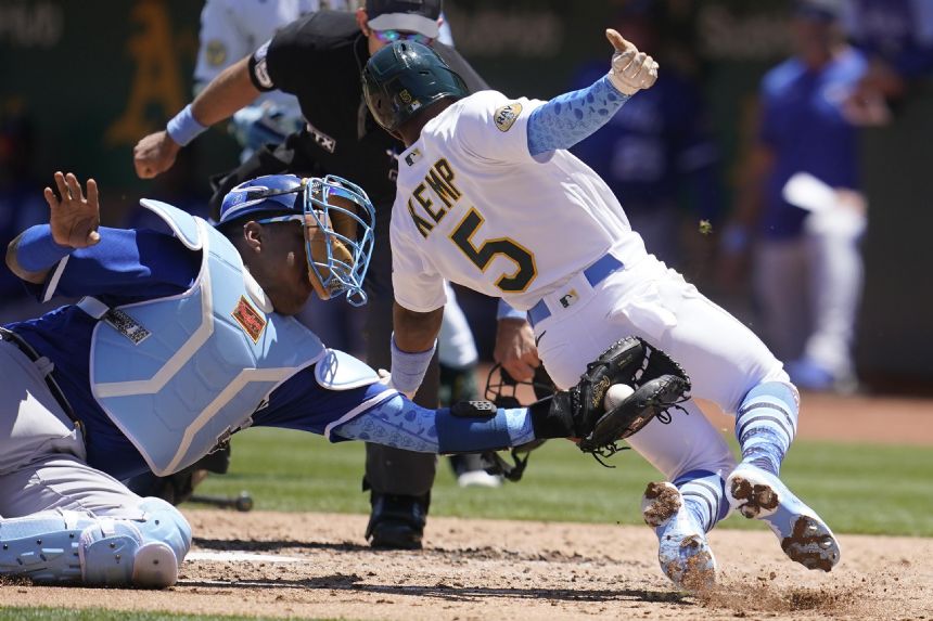 A's pitchers 3-hit Royals; Brown, Murphy homer in 4-0 win