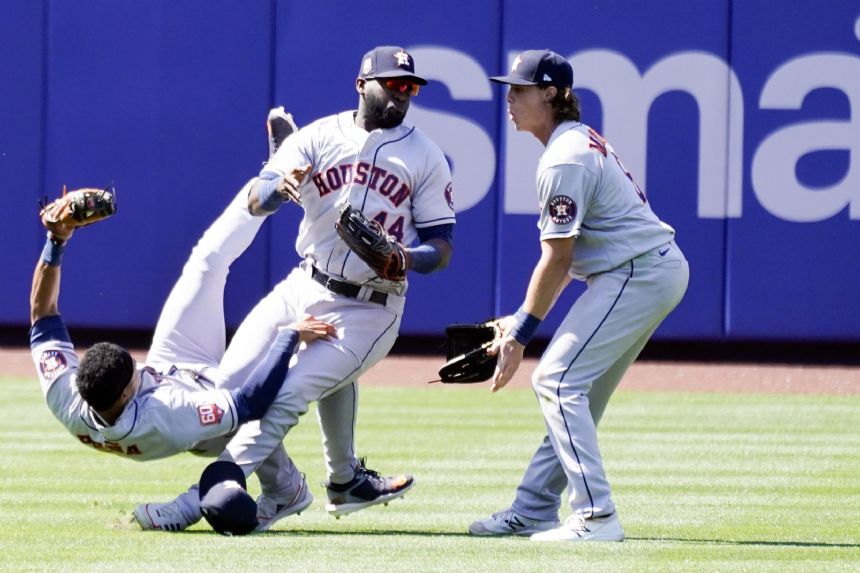 Astros' Alvarez, Pena hurt in collision chasing Mets popup