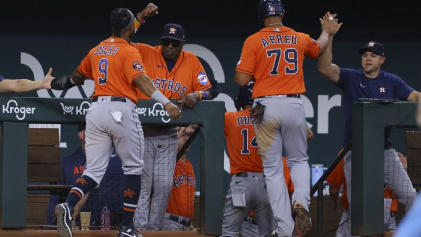 Astros rally for 12-11 win to take series win over AL West-leading Texas after blowing 8-run lead