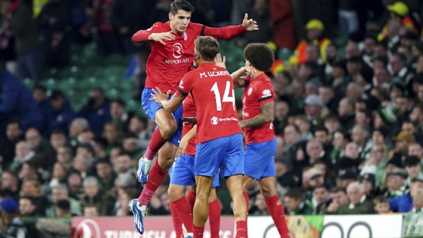 Atletico misses chance to take outright group lead after 2-2 draw at Celtic in Champions League
