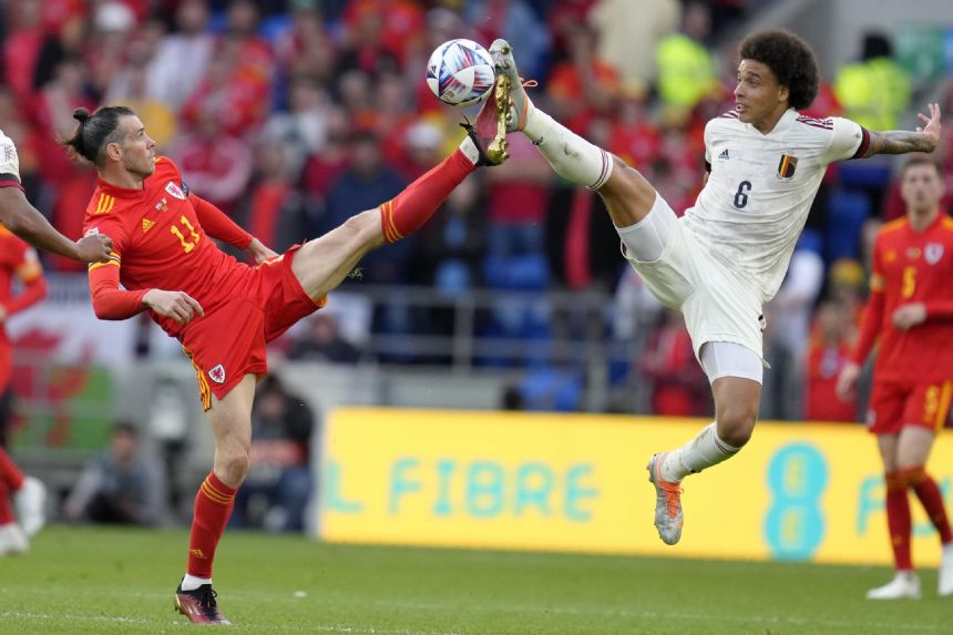 Atletico signs Axel Witsel to add experience to its midfield