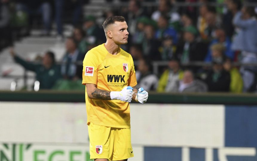 Augsburg keeper preserves 1-0 win at Bremen amid late drama