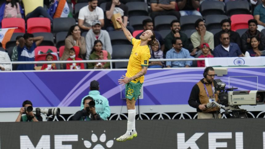 Australia beats India 2-0 in the Asian Cup after goals from Irvine and Bos