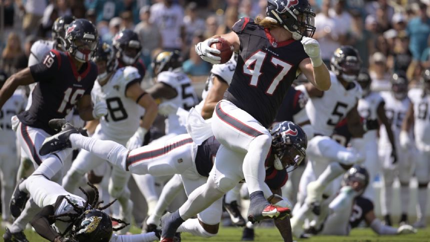 Beck's rare TD return propels Texans to a 37-17 rout of Jaguars and gives Ryans his first win