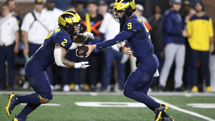 Blake Corum scores 2 TDs, helps No. 2 Michigan pull away to beat Bowling Green 31-6