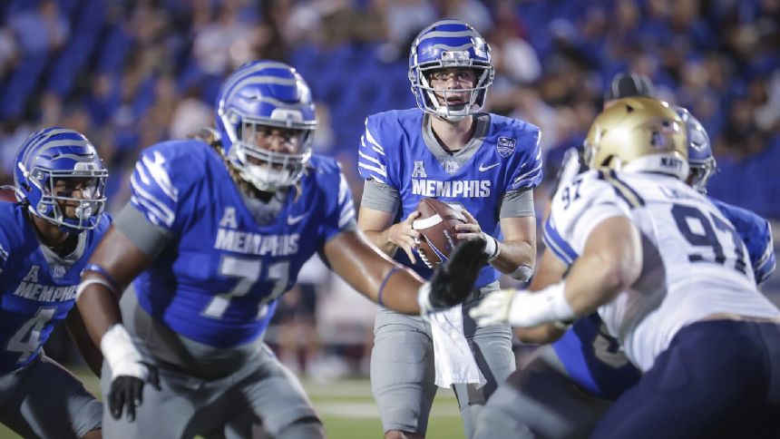 Blake Watson rushes for 169 yards and a TD to help Memphis beat Navy for the 5th straight time