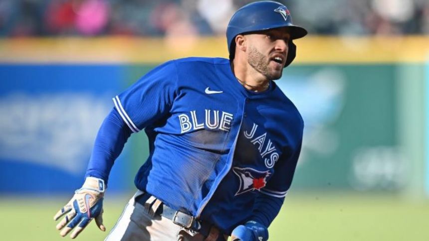 Blue Jays' George Springer leaves game vs. Rays after spraining ankle on catch attempt