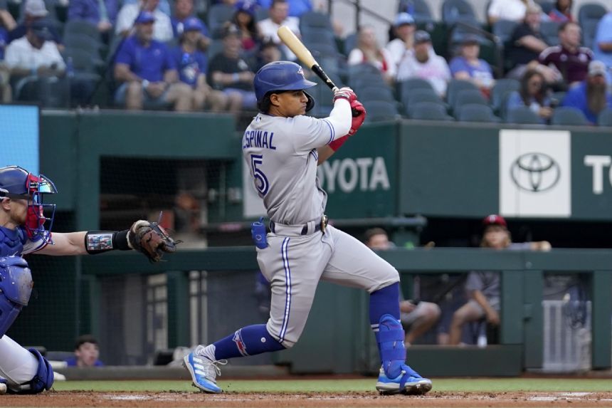 Blue Jays score early and often in 11-7 victory over Rangers