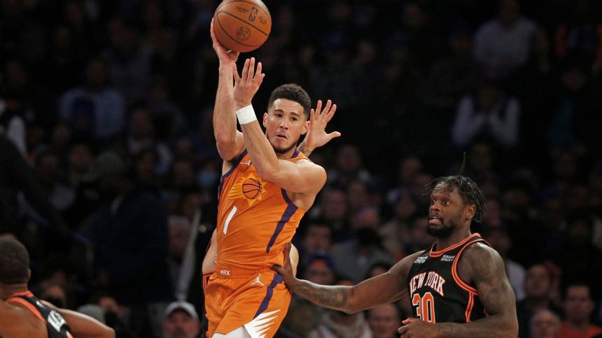 Booker, Suns extend win streak to 15, beat Knicks 118-97