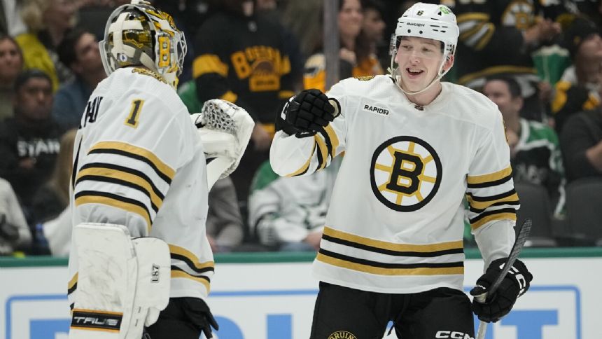 Boston rookies Beecher and Lohrei score 1st NHL goals in Bruins' 3-2 victory over Stars