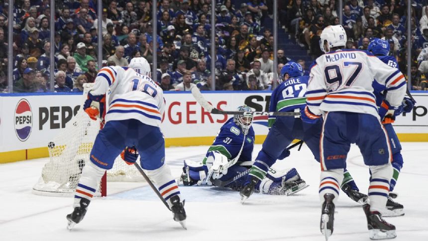 Bouchard scores in OT to lift Oilers to 4-3 win over Canucks in Game 2 to even playoff series