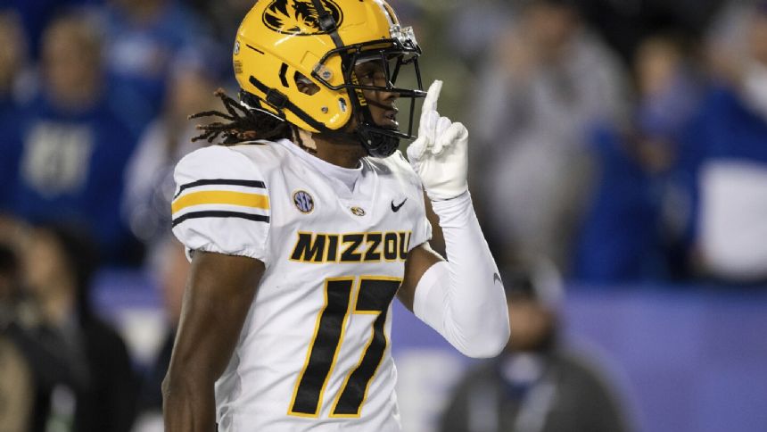 Brady Cook throws for a TD and scores on a run as Missouri takes down No. 24 Kentucky 38-21