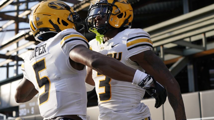 Brady Cook throws for career-high 395 yards, No. 23 Missouri beats Vandy 38-21