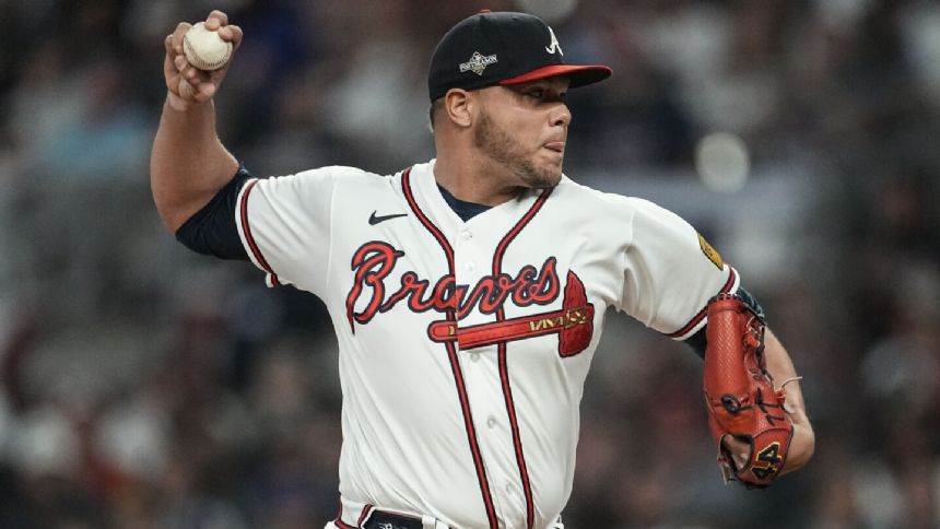 Braves re-sign pitcher Jimenez to a $26 million, three-year contract, further bolstering bullpen