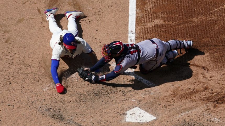 Braves survive Bryce Harper's tying homer in 9th to beat Phillies 10-8 in Game 1 of doubleheader