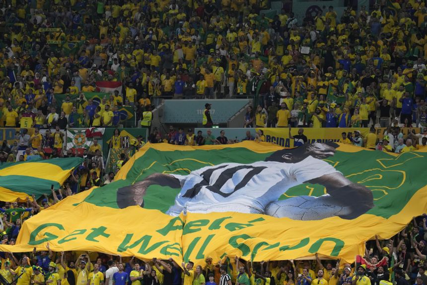 Brazil fans at World Cup game remember soccer great Pele