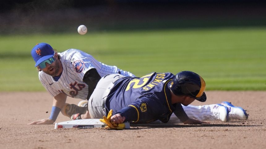Brewers beat Mets 3-1 behind Yelich and Peralta as tempers flare in season opener