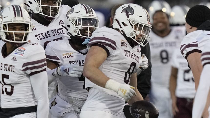 Brian Holloway returns 2 picks for TDs, Texas State beats Rice 45-21 in First Responder Bowl