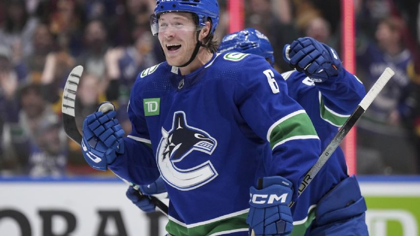 Brock Boeser scores 4 goals, Canucks rout Oilers 8-1 to start a home-and-home opening set