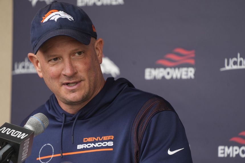 Broncos' Hackett hires Rosburg to help him in his decisions