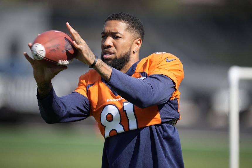 Broncos wide receiver Tim Patrick carted off with leg injury