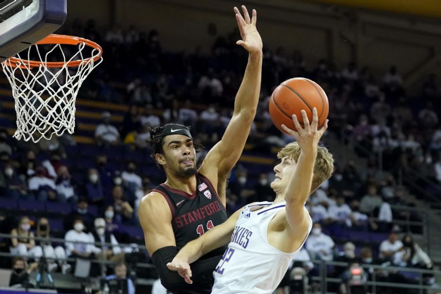 Brown scores 25, Washington holds on to beat Stanford 67-64