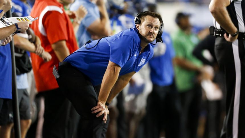 Brown sparks Tulane rally in 31-21 victory over Memphis