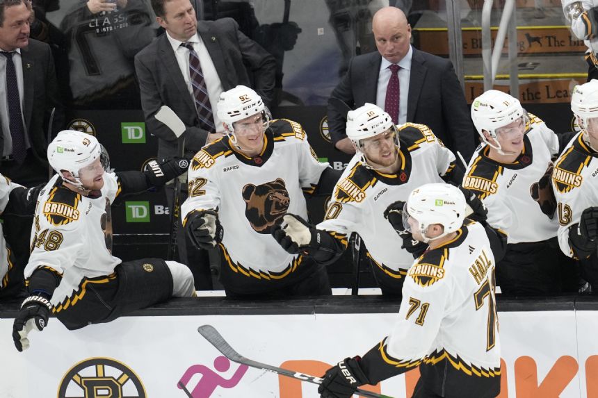 Bruins extend NHL-record season-opening home win streak
