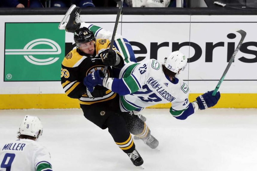 Bruins F Marchand suspended 3 games for slew-footing Canuck